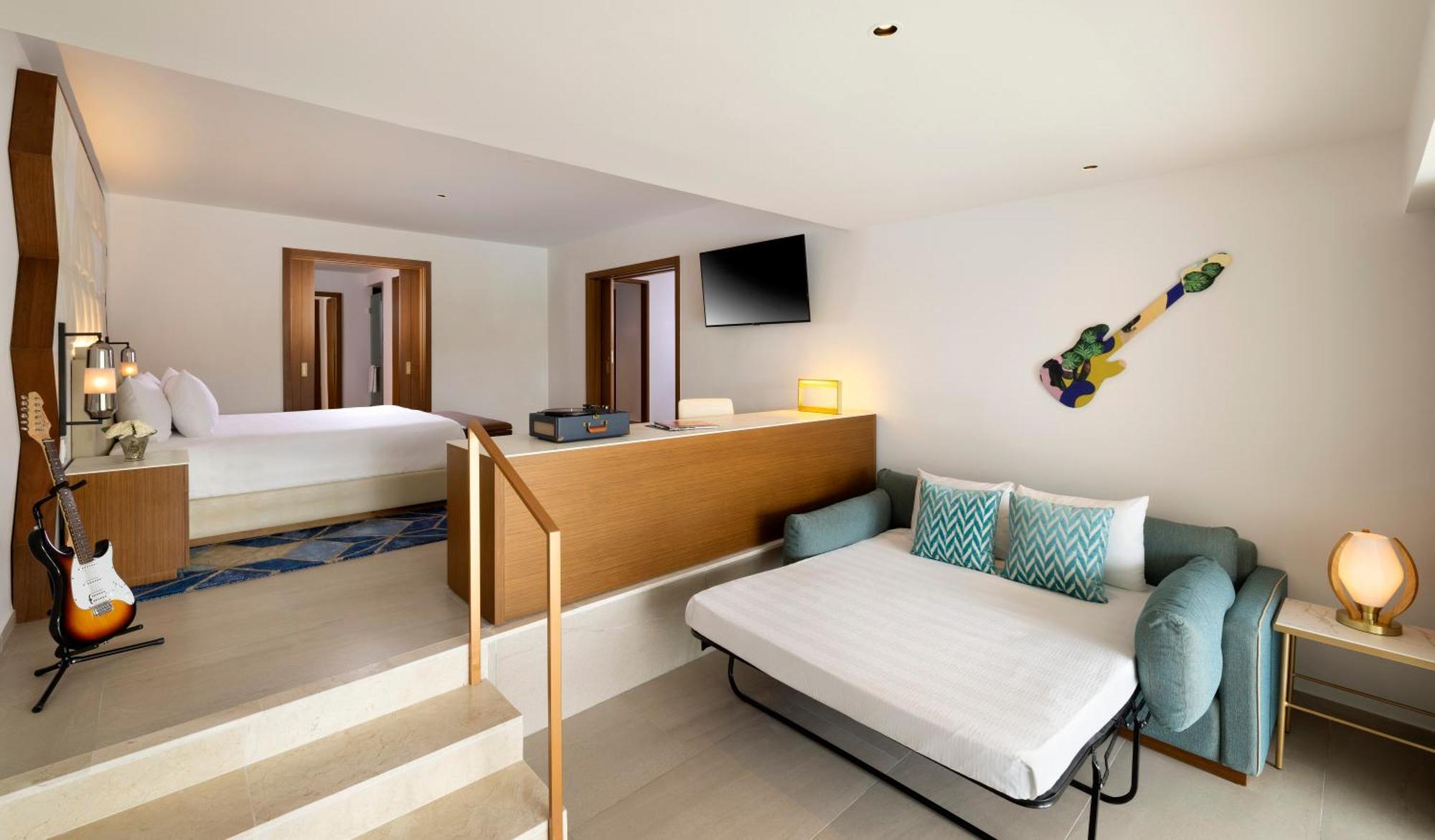 Suite Rock con 1 Camera da Letto, Letto King-Size, Divano-Letto e Assistente Personale