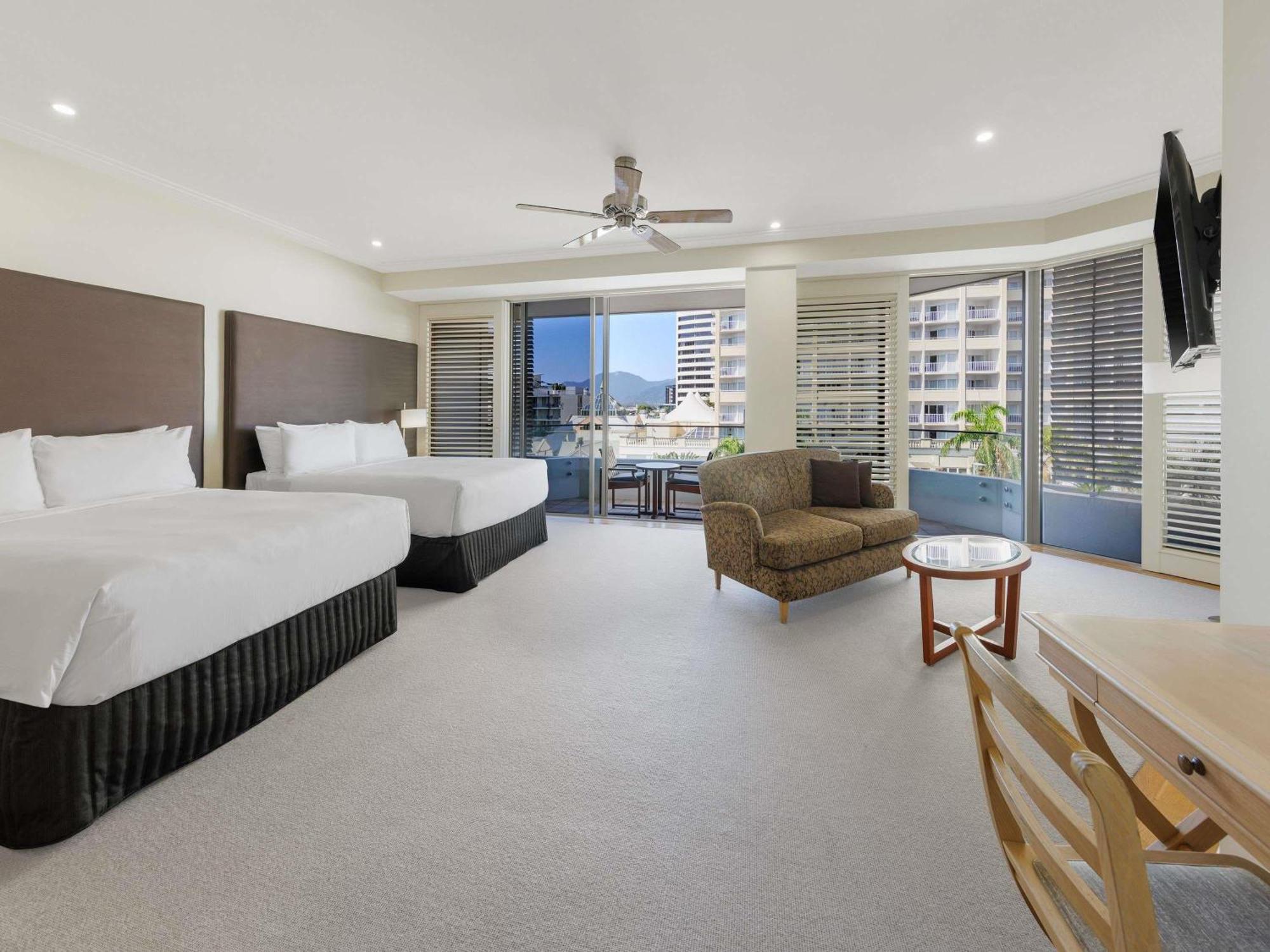 Junior Twin Suite Two Double Beds City Views one drink voucher