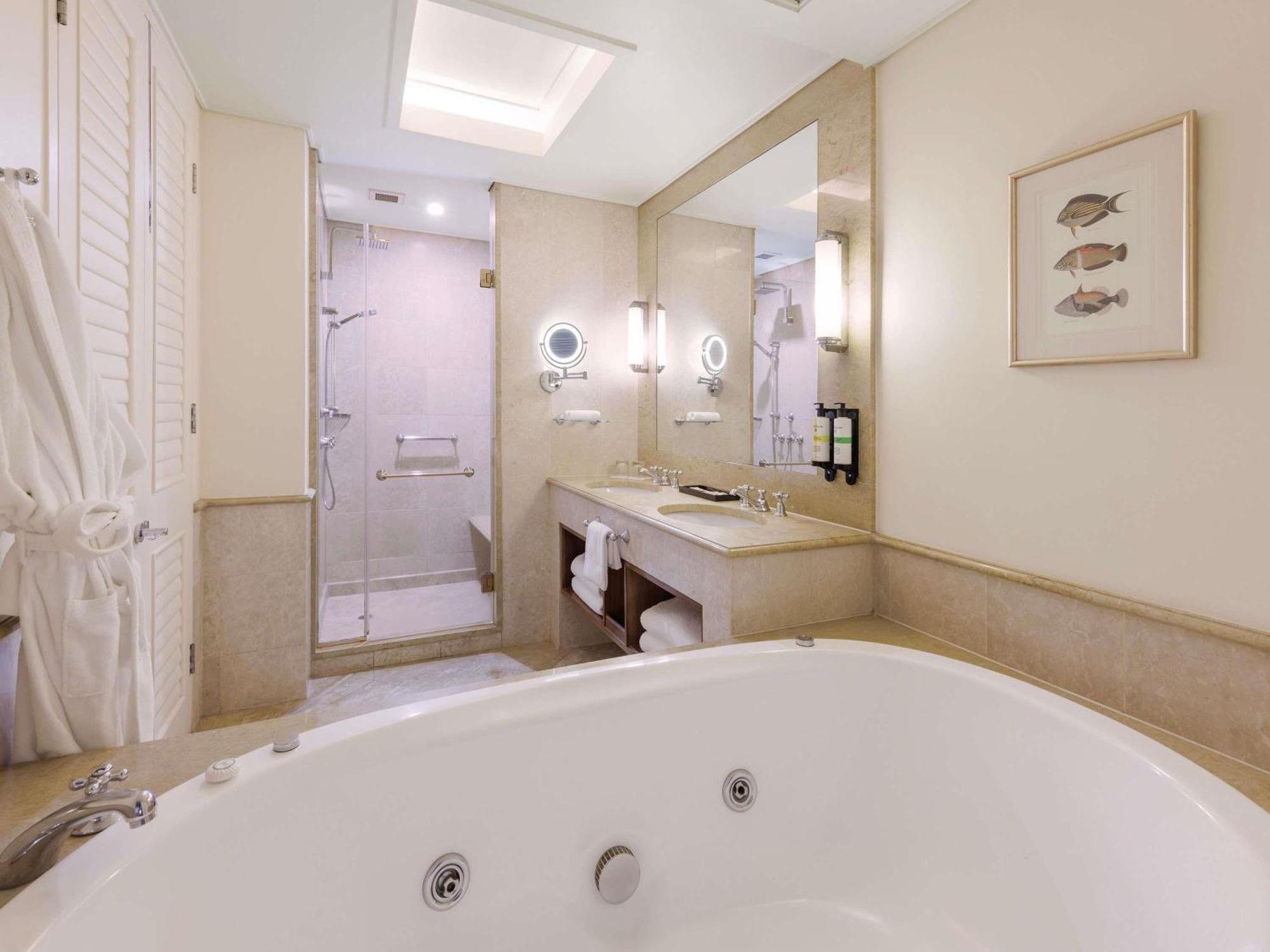 Junior Twin Suite Two Double Beds City Views one drink voucher